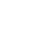 Person operating control panel with helmet.